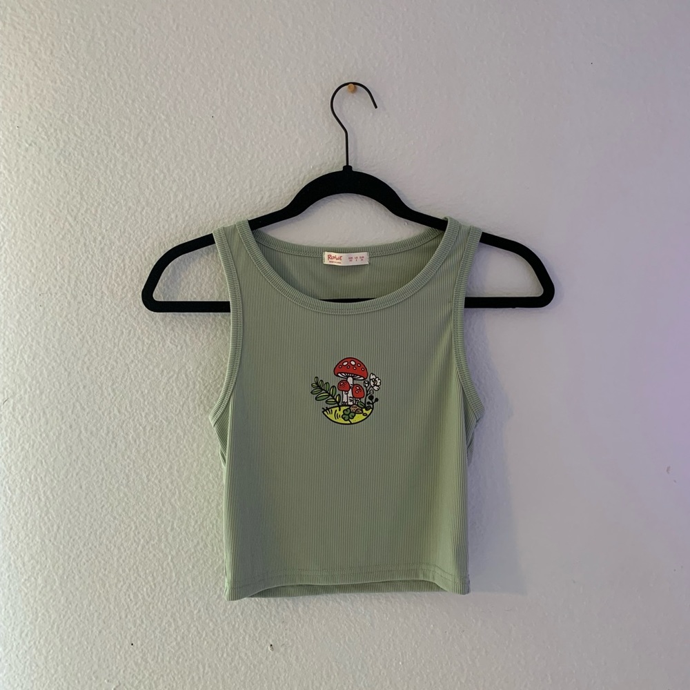 green cropped top